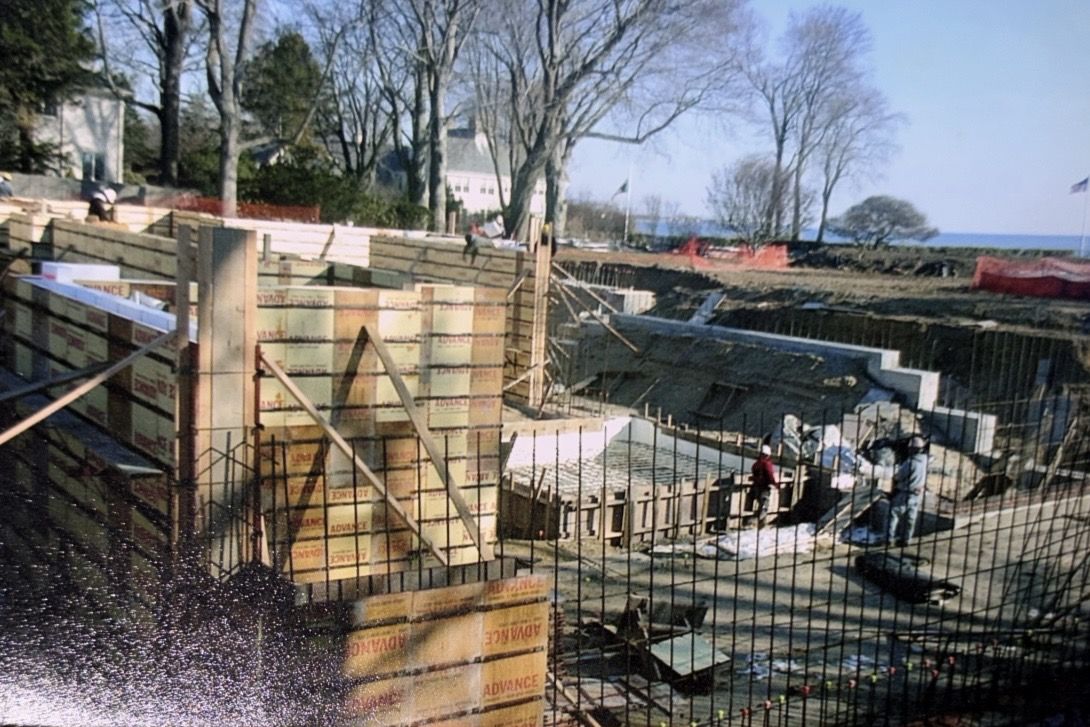 Older photo of forms and rebar on a shoreline home site