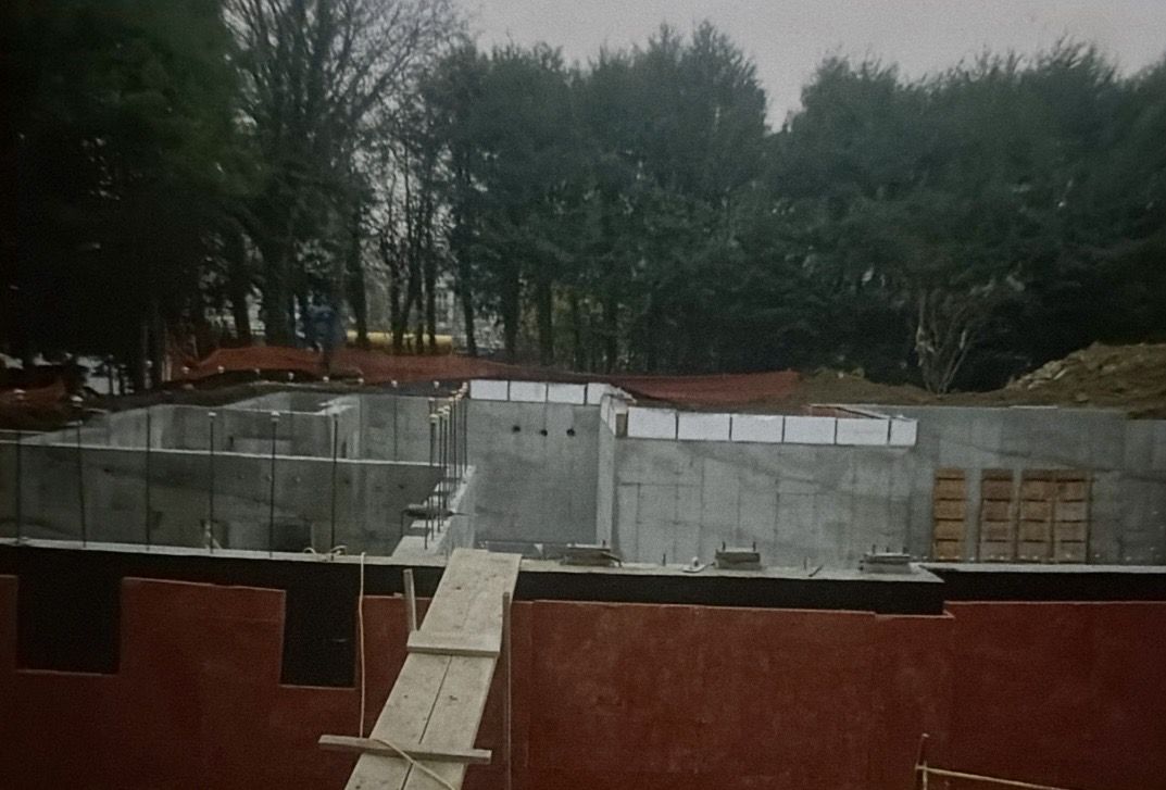 Older photo of a completed foundation with waterproofing