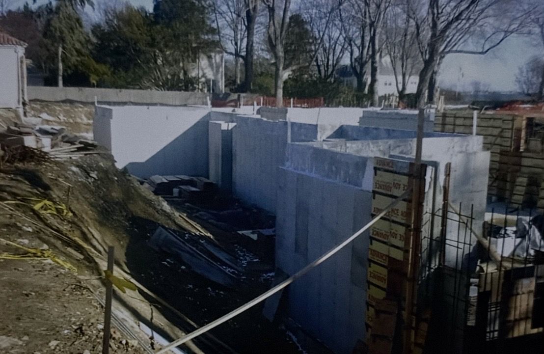 Older photo of freshly stripped foundation walls