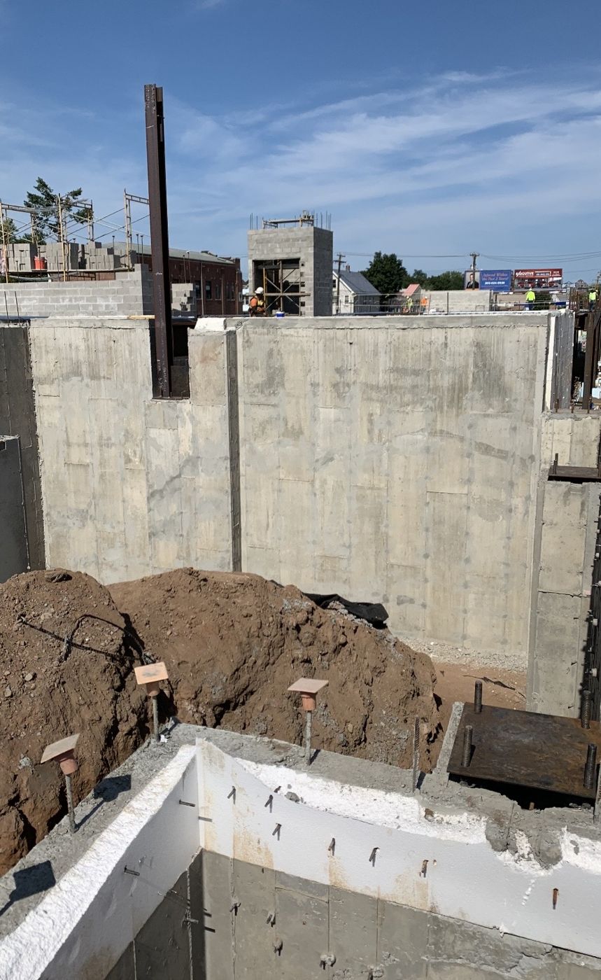 Tall finished concrete walls on a commercial site